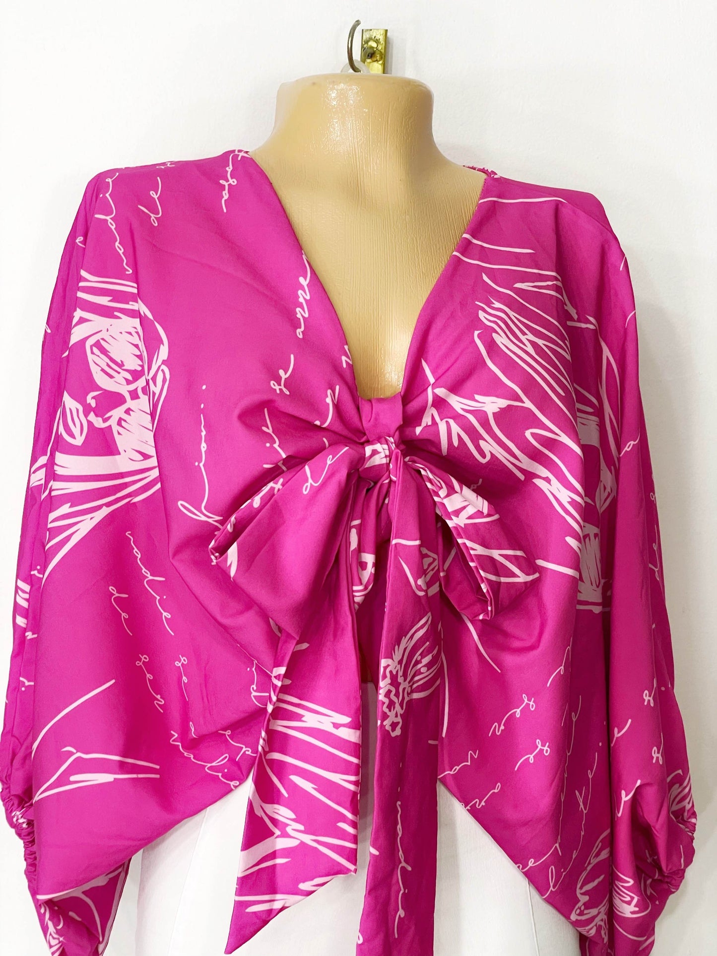 Blusa fondo fucsia