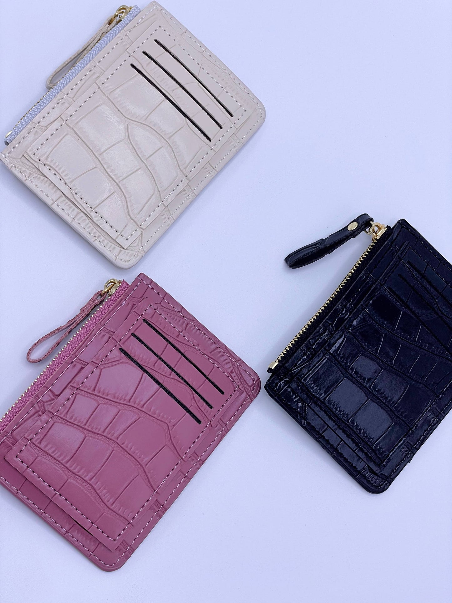 Cartera de cocodrilo rosa oscuro