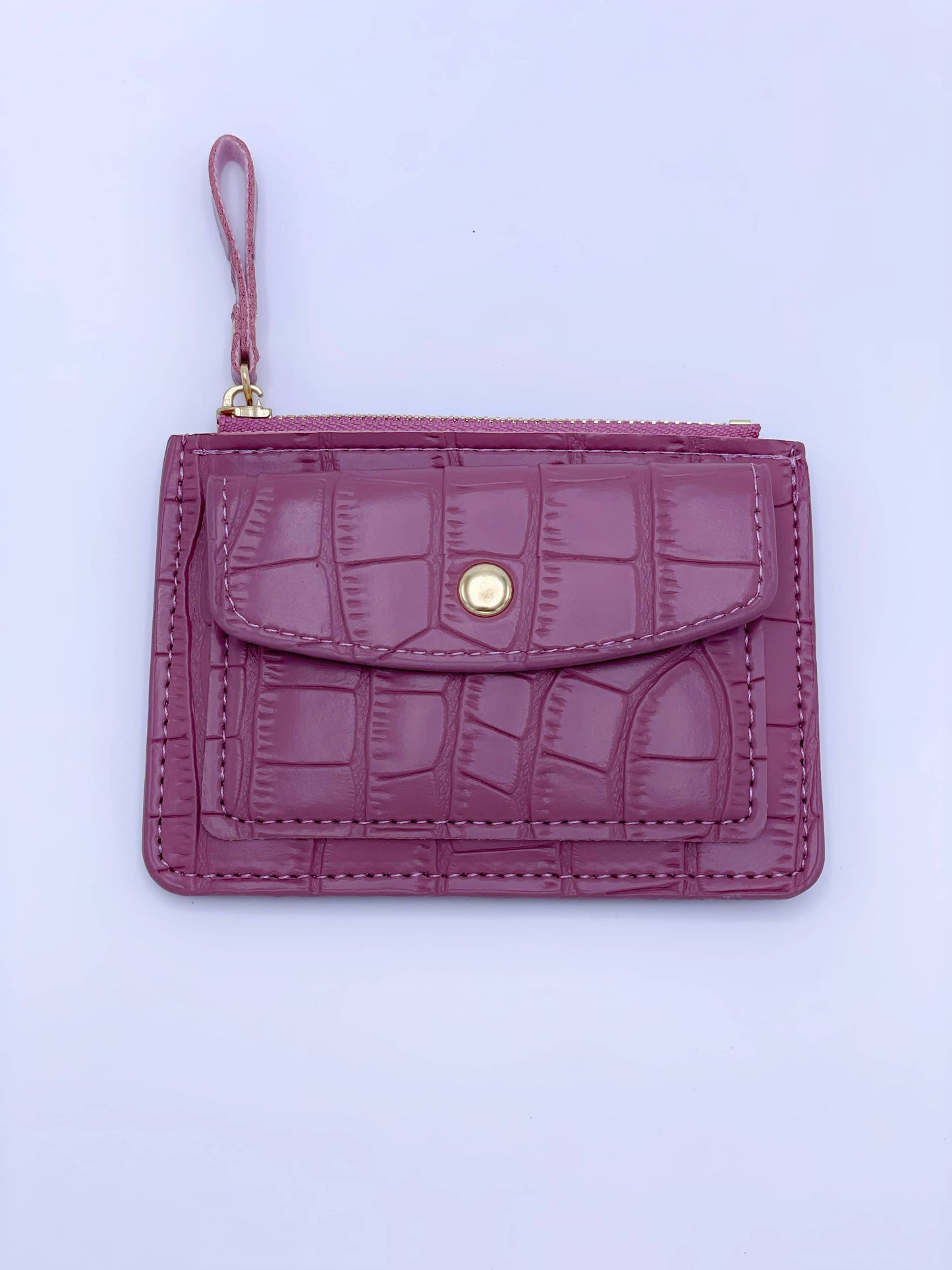 Cartera de cocodrilo rosa oscuro