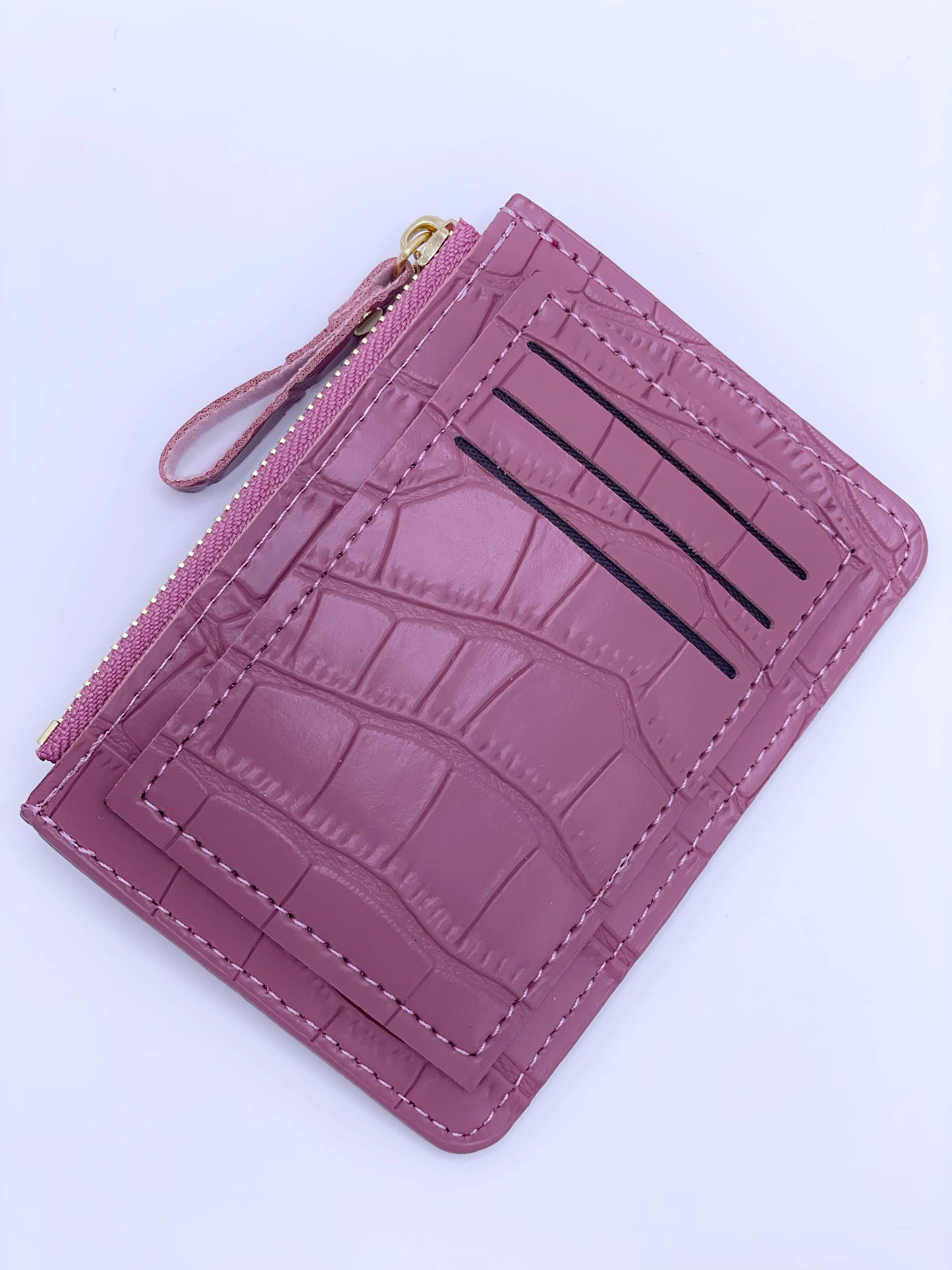 Cartera de cocodrilo rosa oscuro