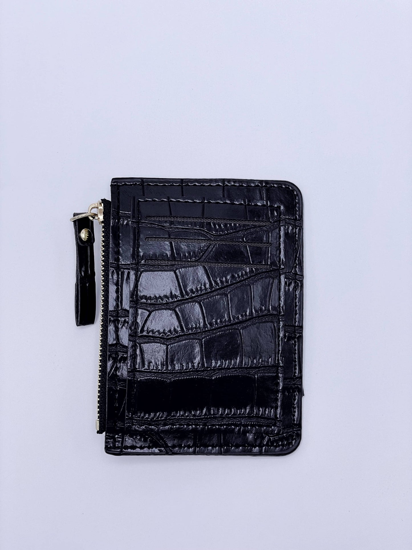 Cartera de cocodrilo negra
