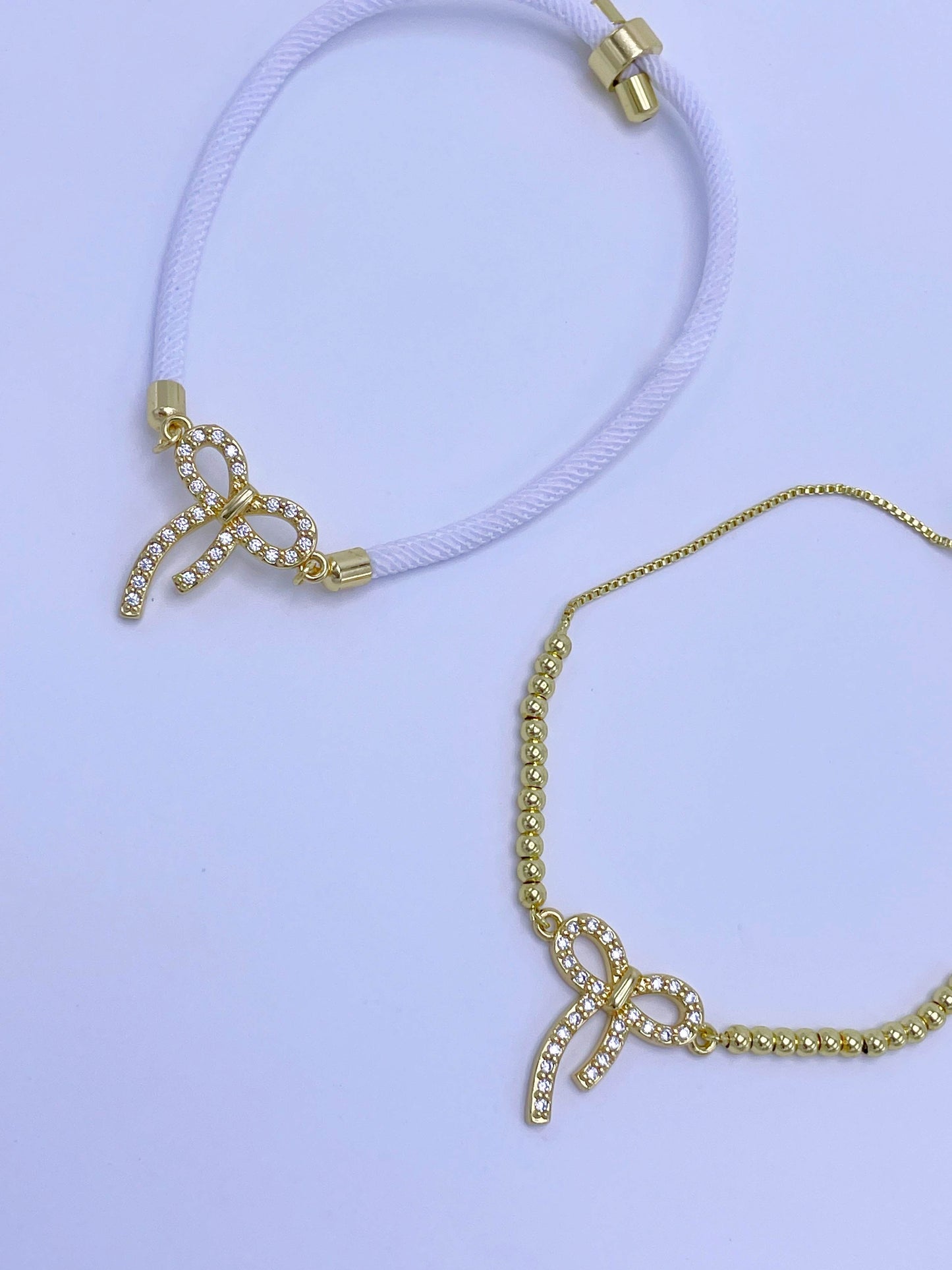 Pulsera graduable dije moño