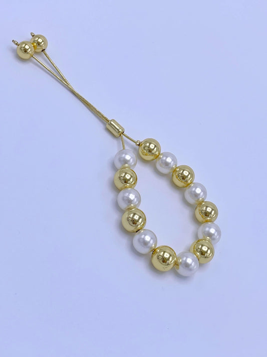 Pulsera graduable de balines 10 mm blanco-dorado