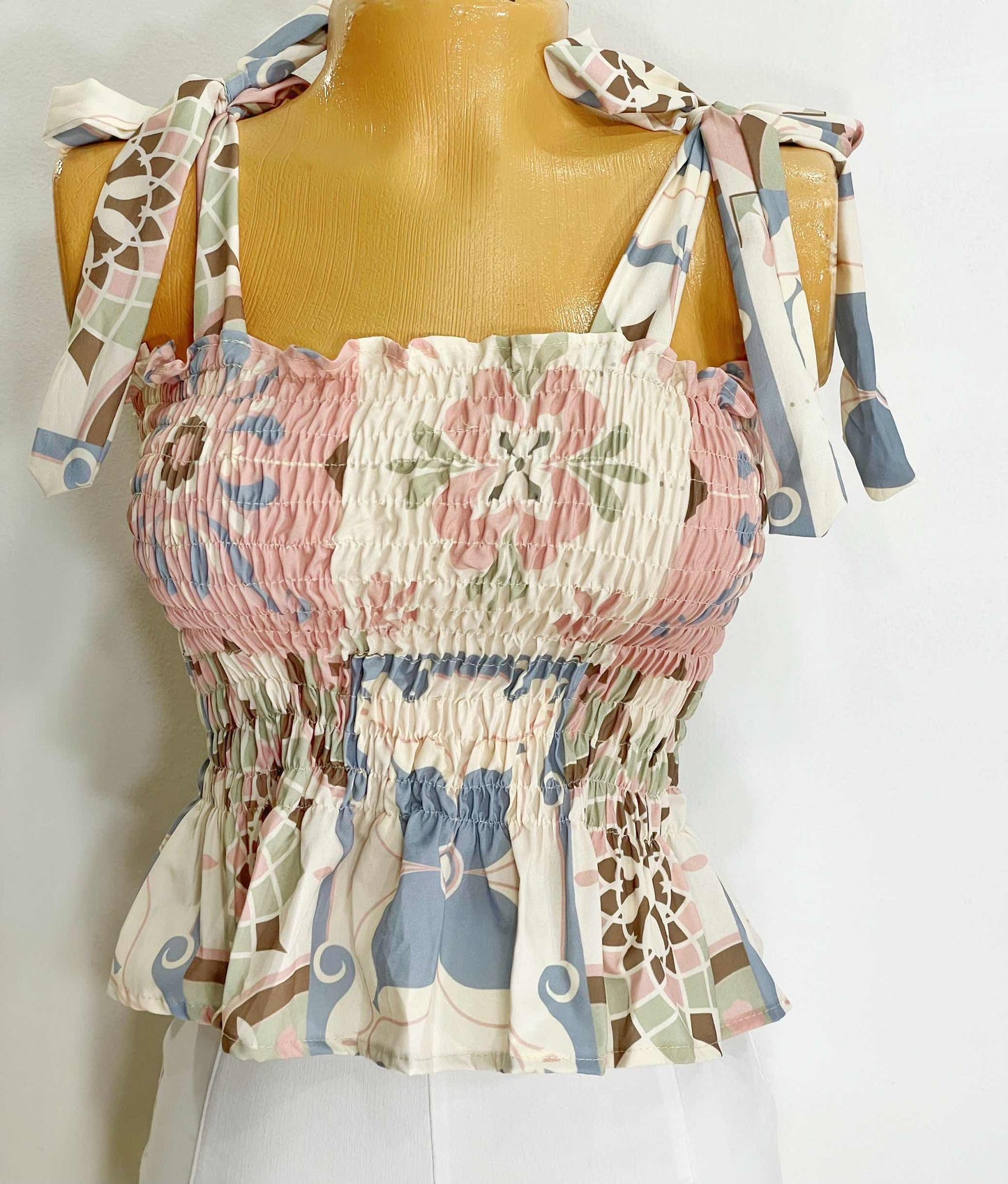 Blusa de boleros fondo tonos pastel