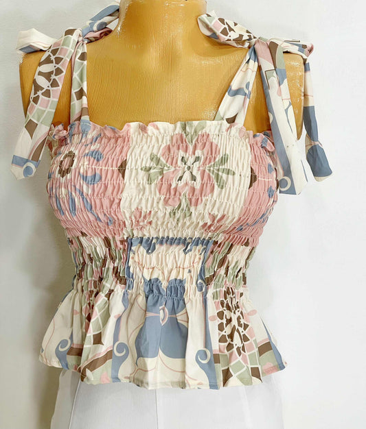 Blusa de boleros fondo tonos pastel