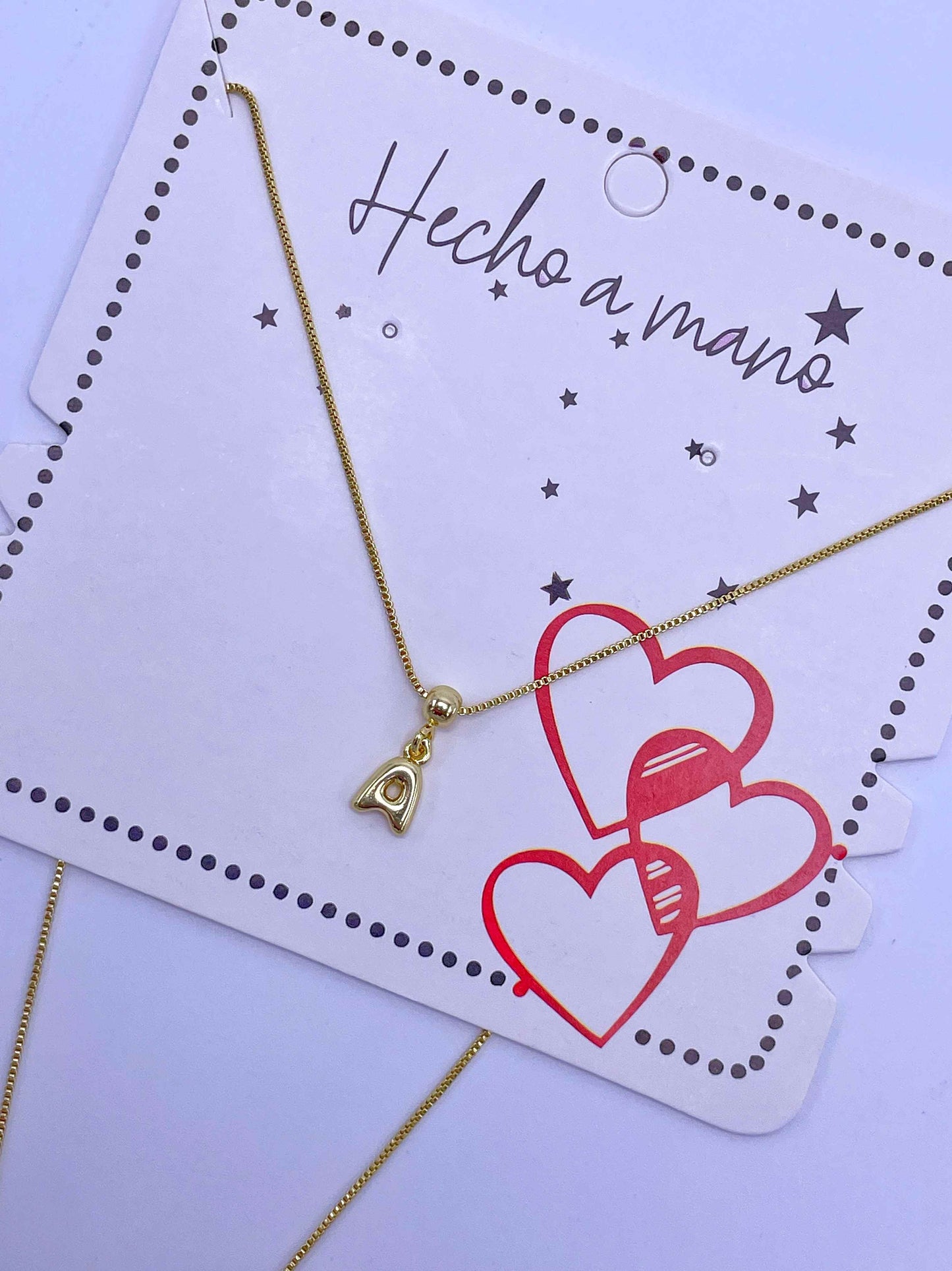 Cadena aguja con inicial