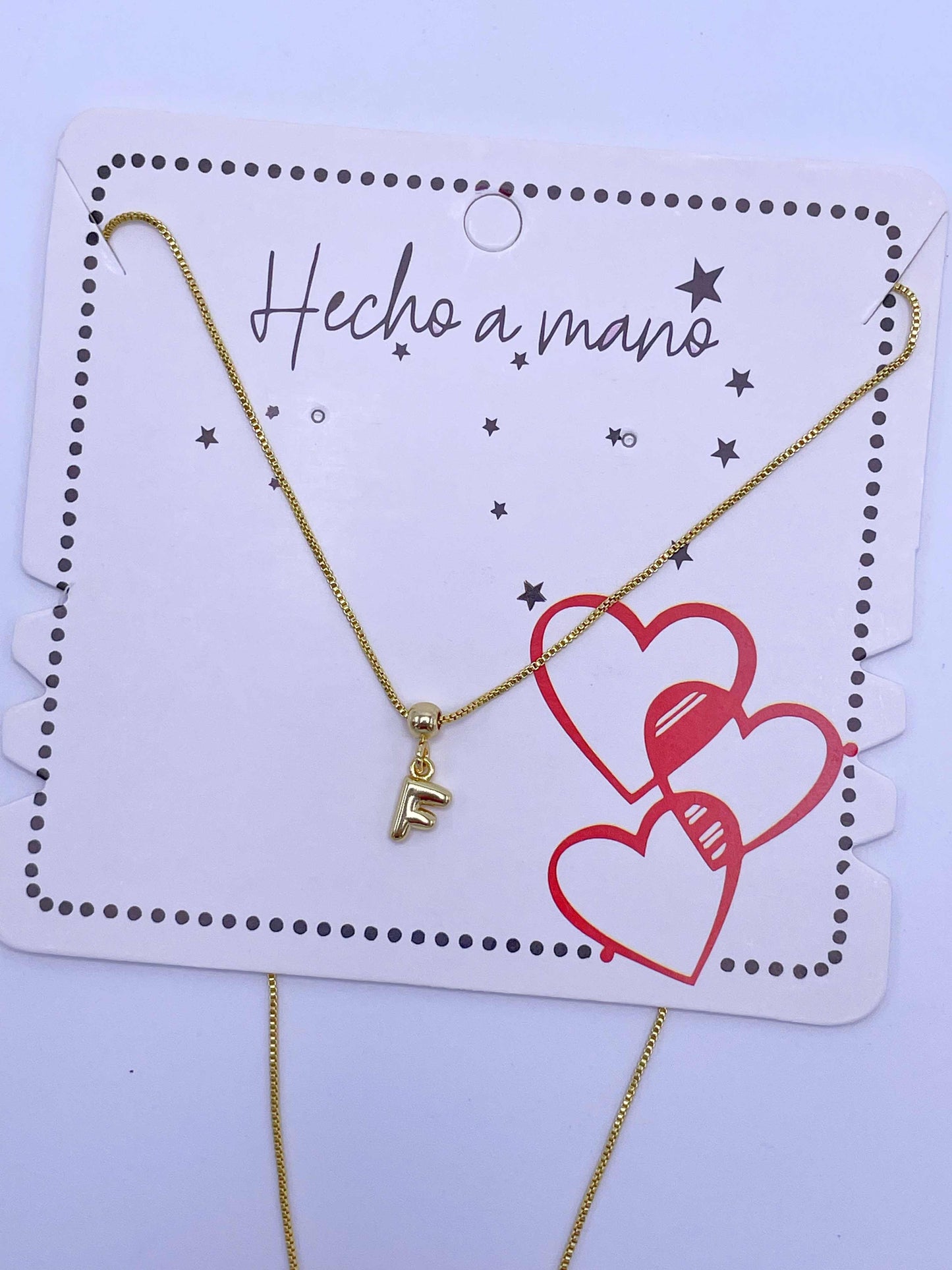 Cadena aguja con inicial