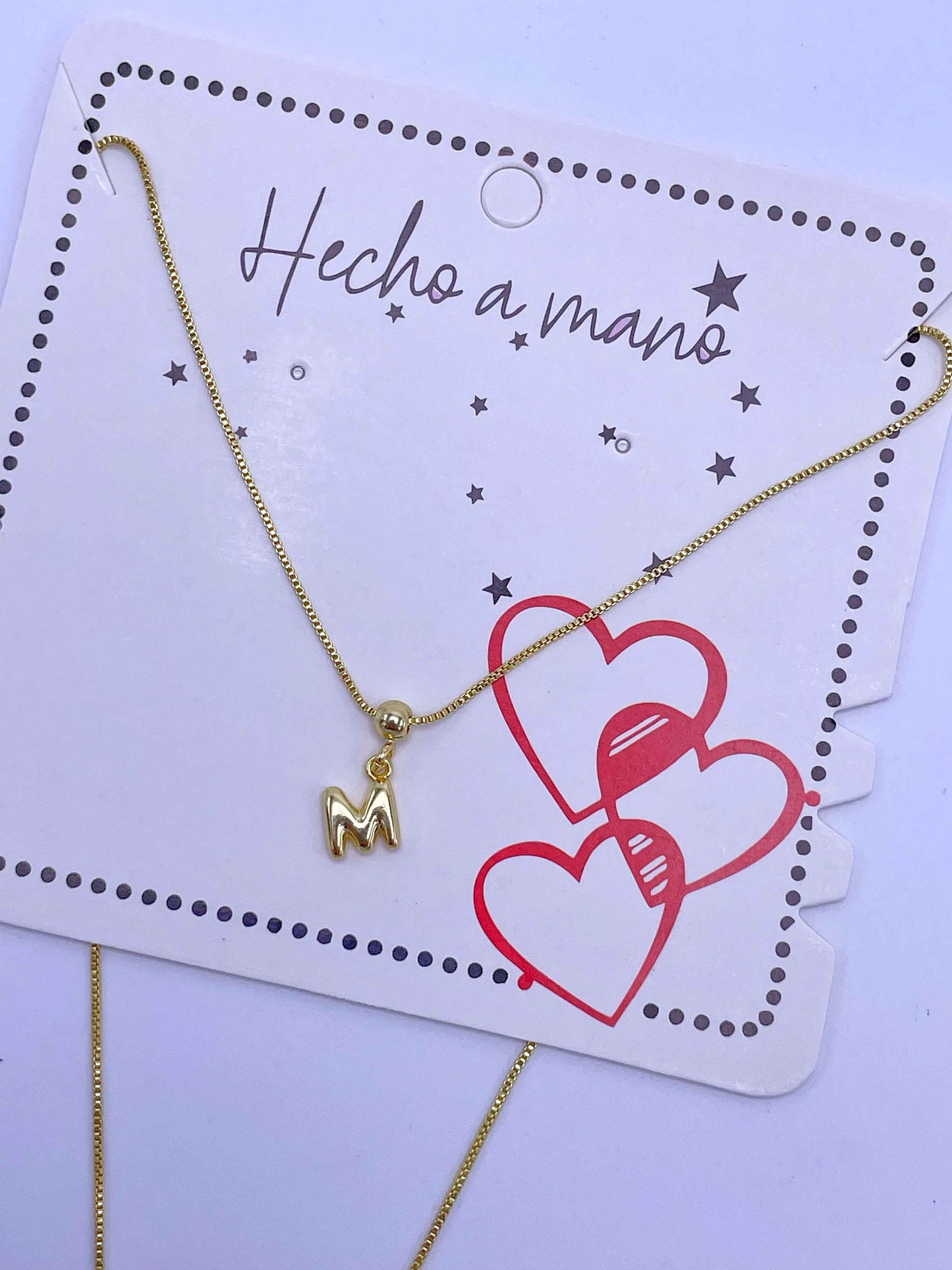 Cadena aguja con inicial