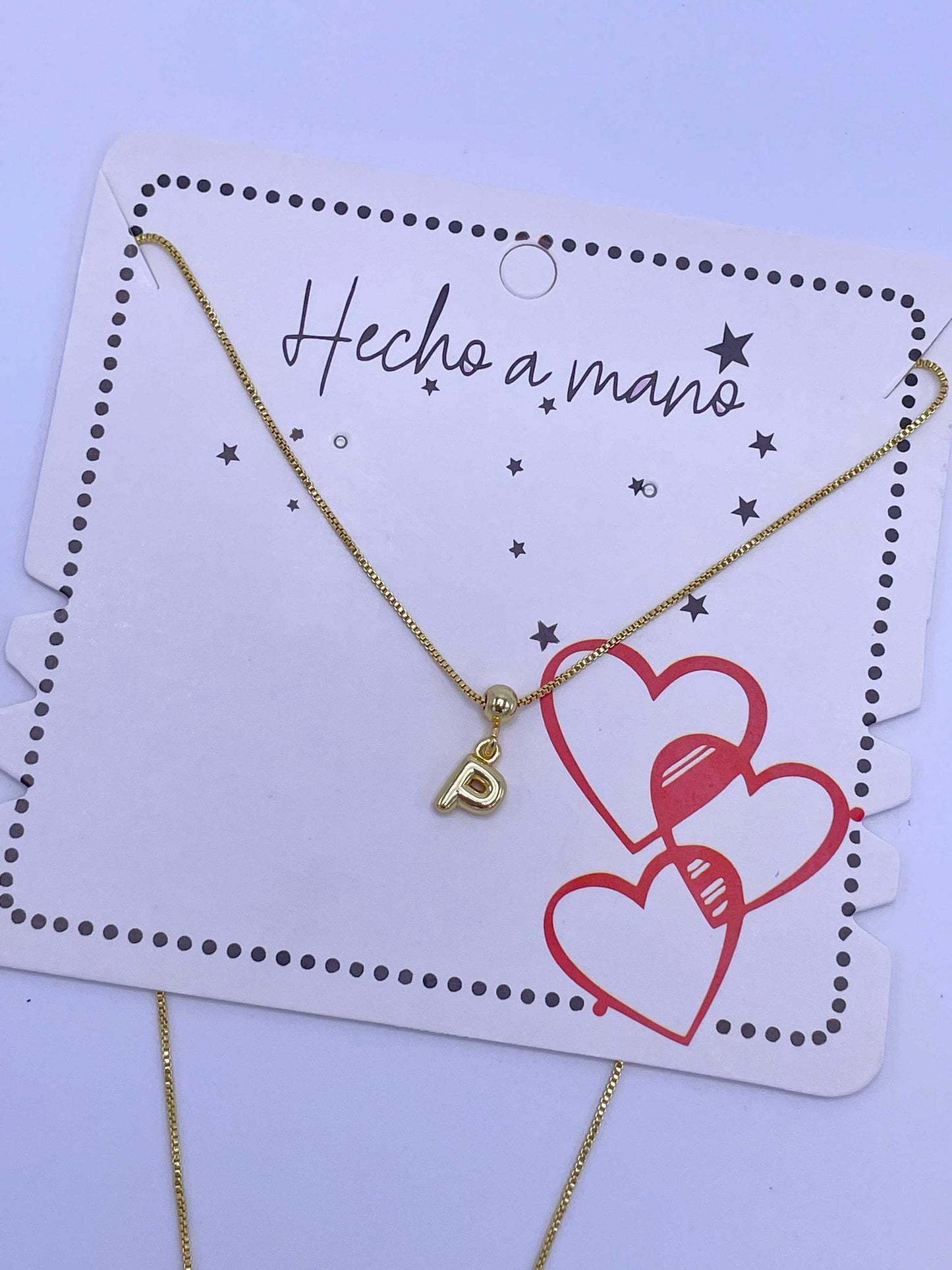 Cadena aguja con inicial