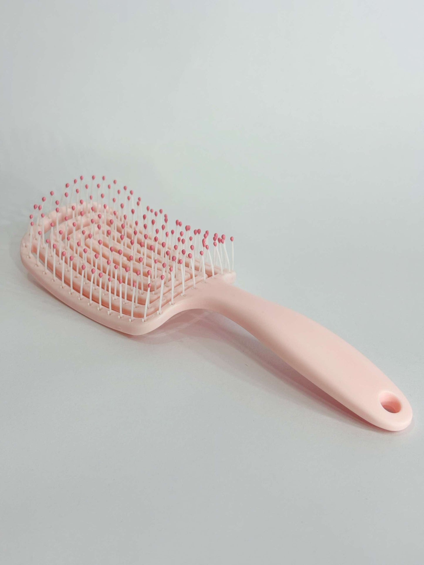 Cepillo desenredante rosa