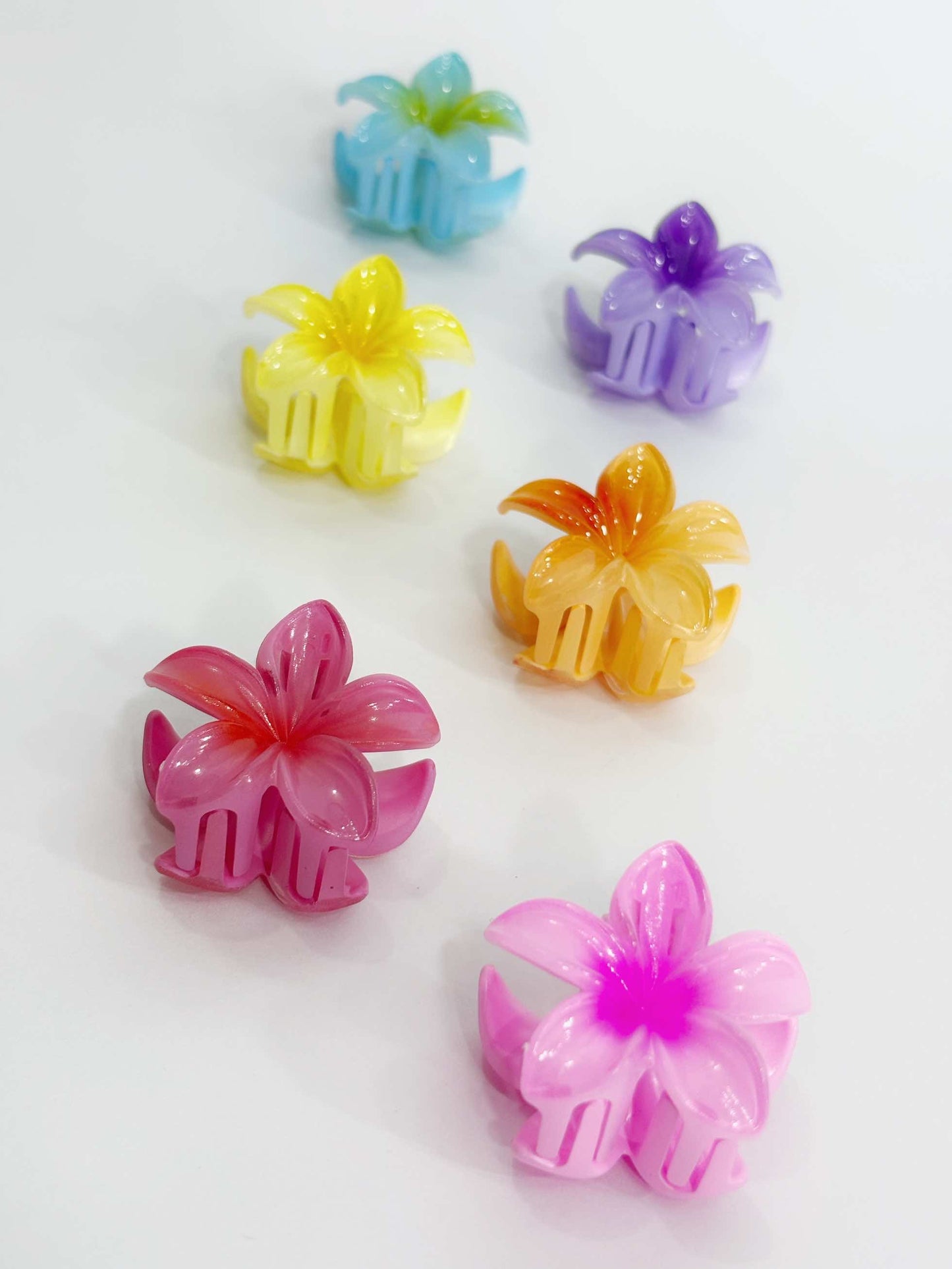 Mini pinza en forma de flor hawaiana