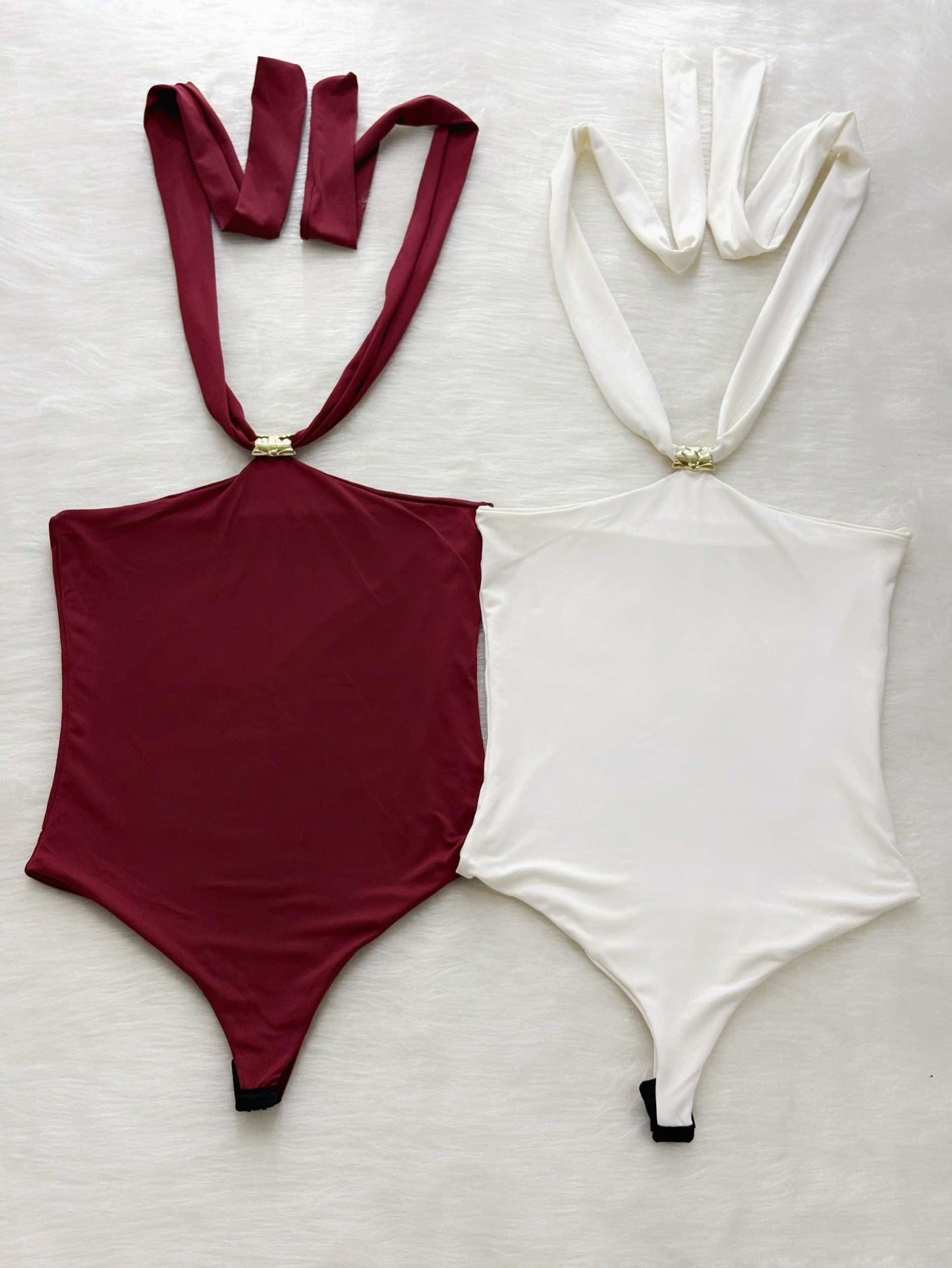 Body con detalle dorado