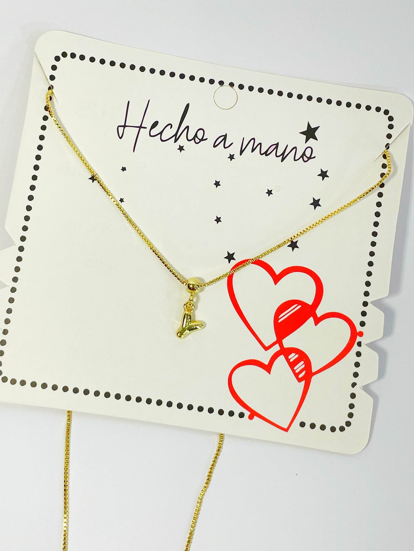 Cadena aguja con inicial