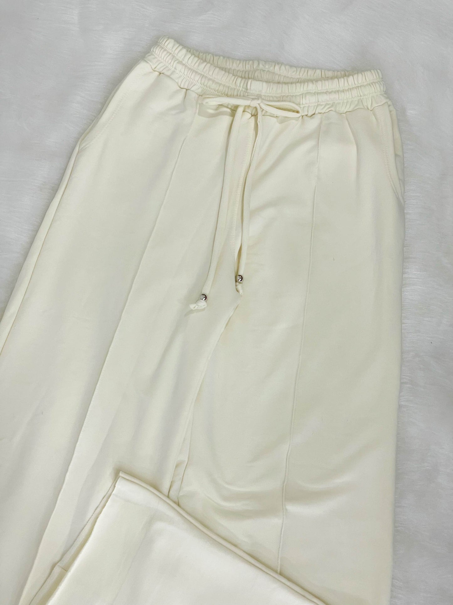 Pantalón bota campana crema