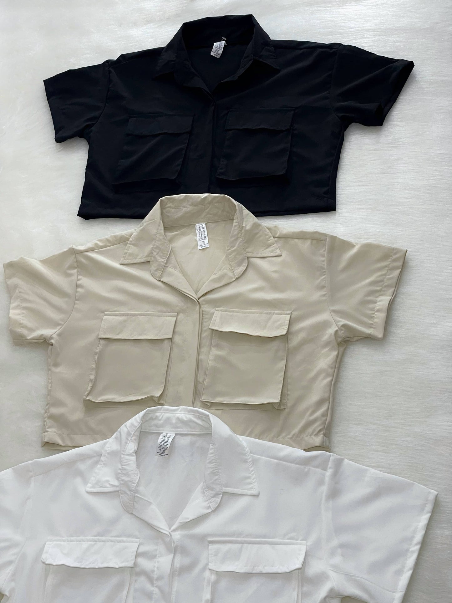 Camisa de bolsillos blanca