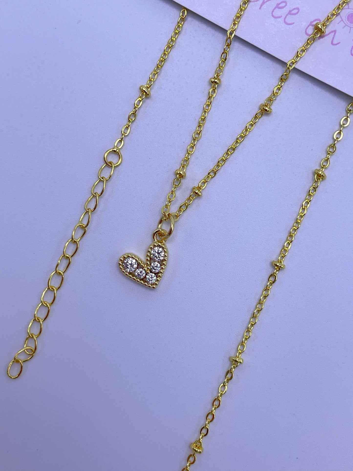 Cadena de balines dije corazón plateado