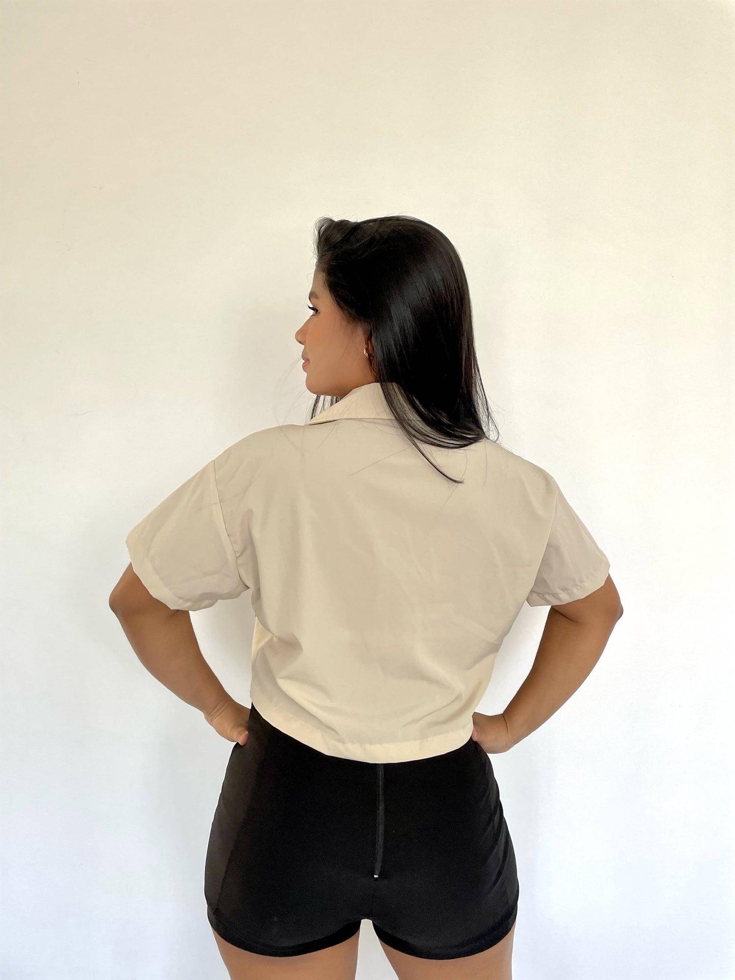 Camisa de bolsillos beige