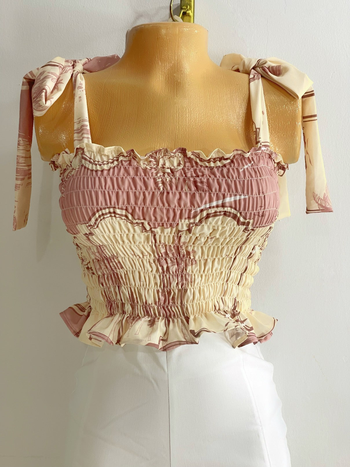 Blusa de boleros fondo rosa bebe