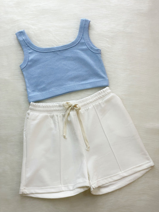 Set crop top + short azul bebe y blanco