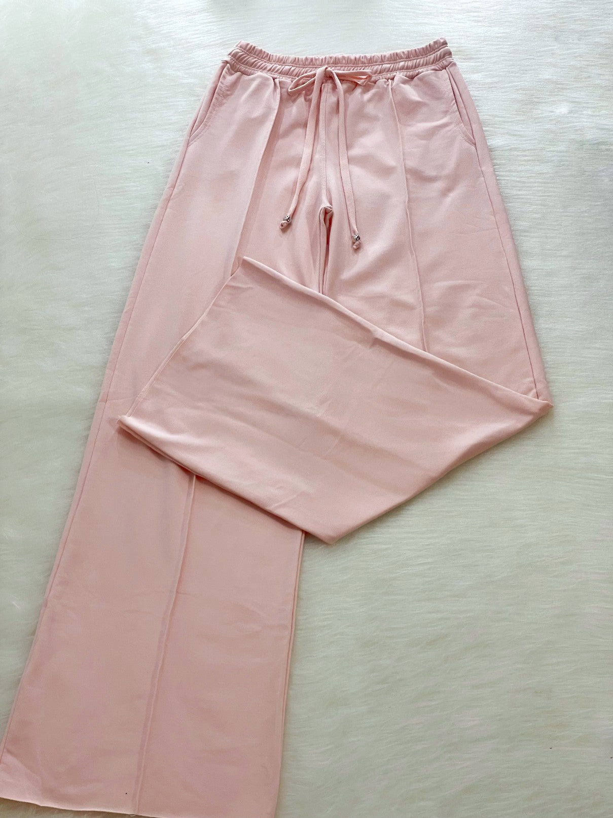 Pantalón bota campana rosa bebe