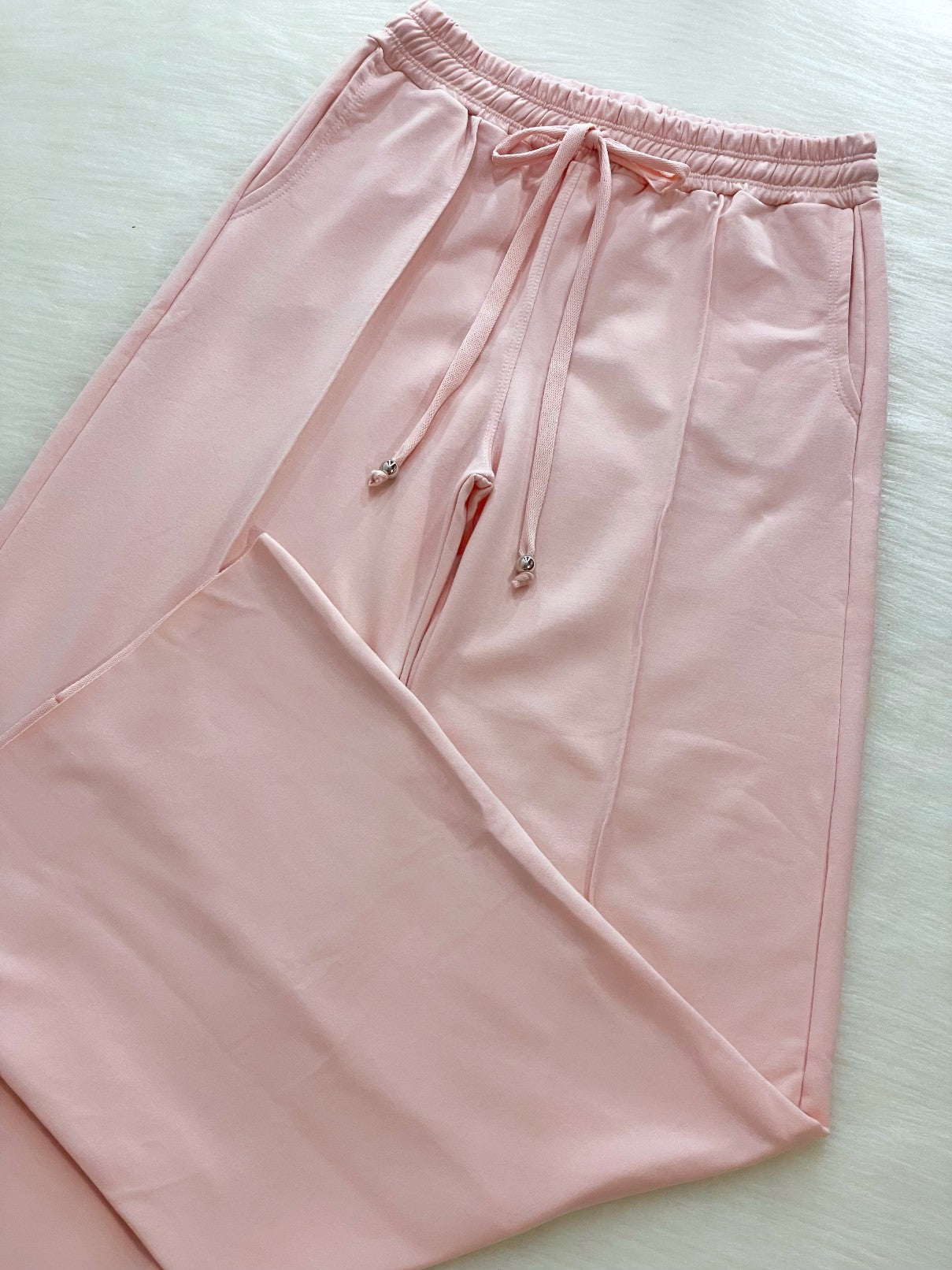 Pantalón bota campana rosa bebe
