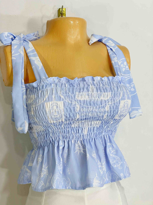 Blusa de boleros fondo azul bebe
