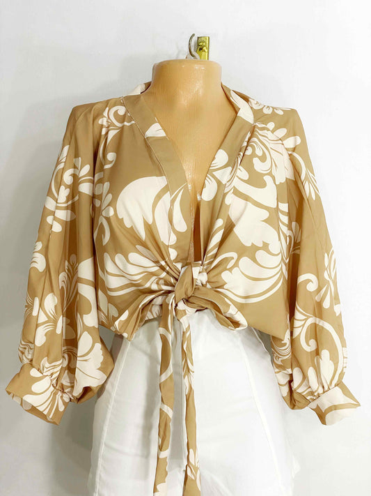 Blusa estampada fondo beige
