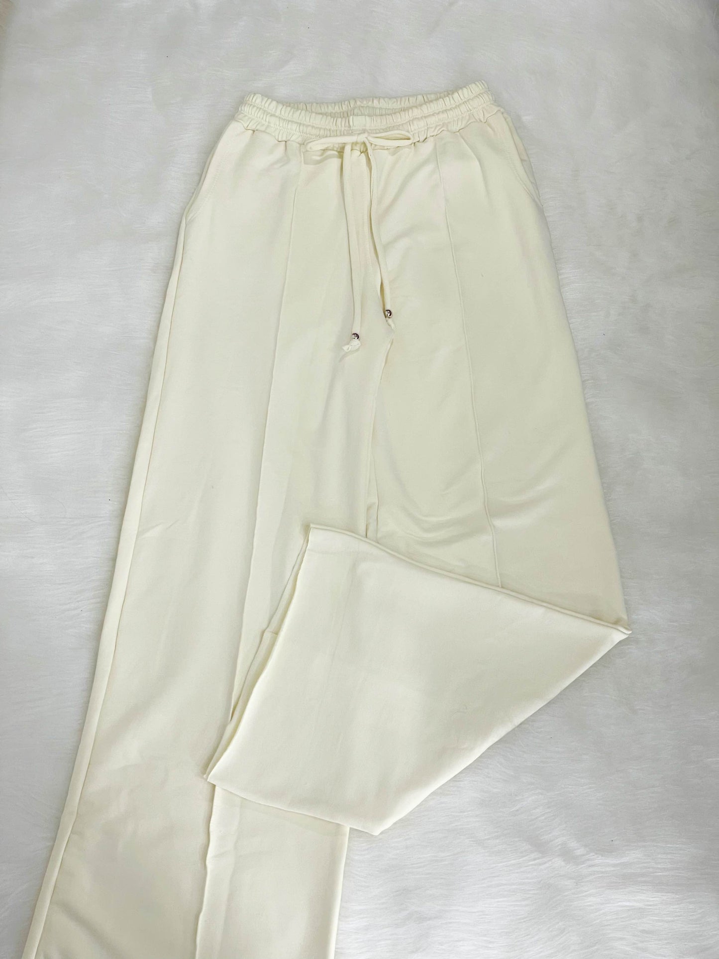 Pantalón bota campana crema